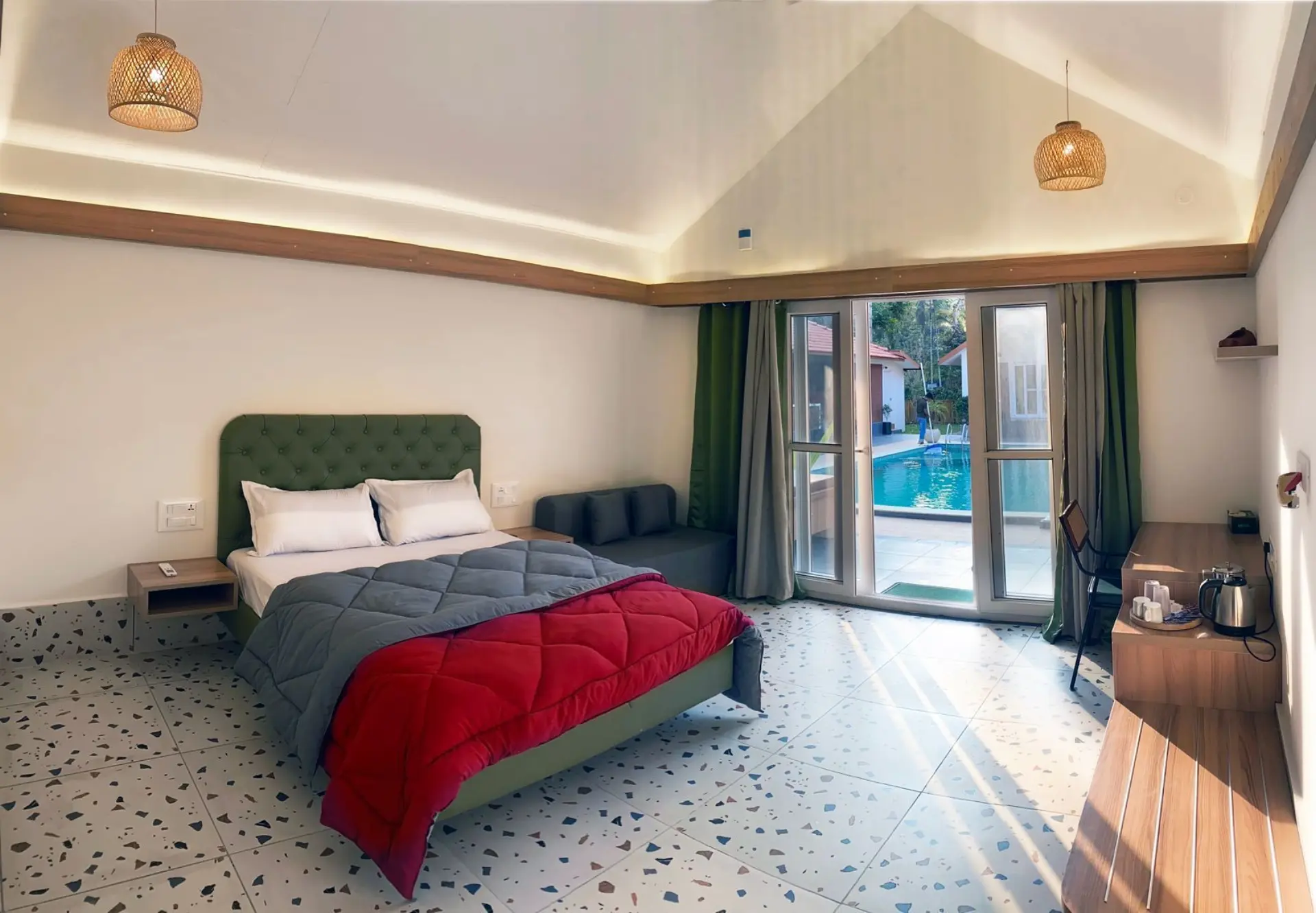 Spacious bedroom at Imara Stay with pool view