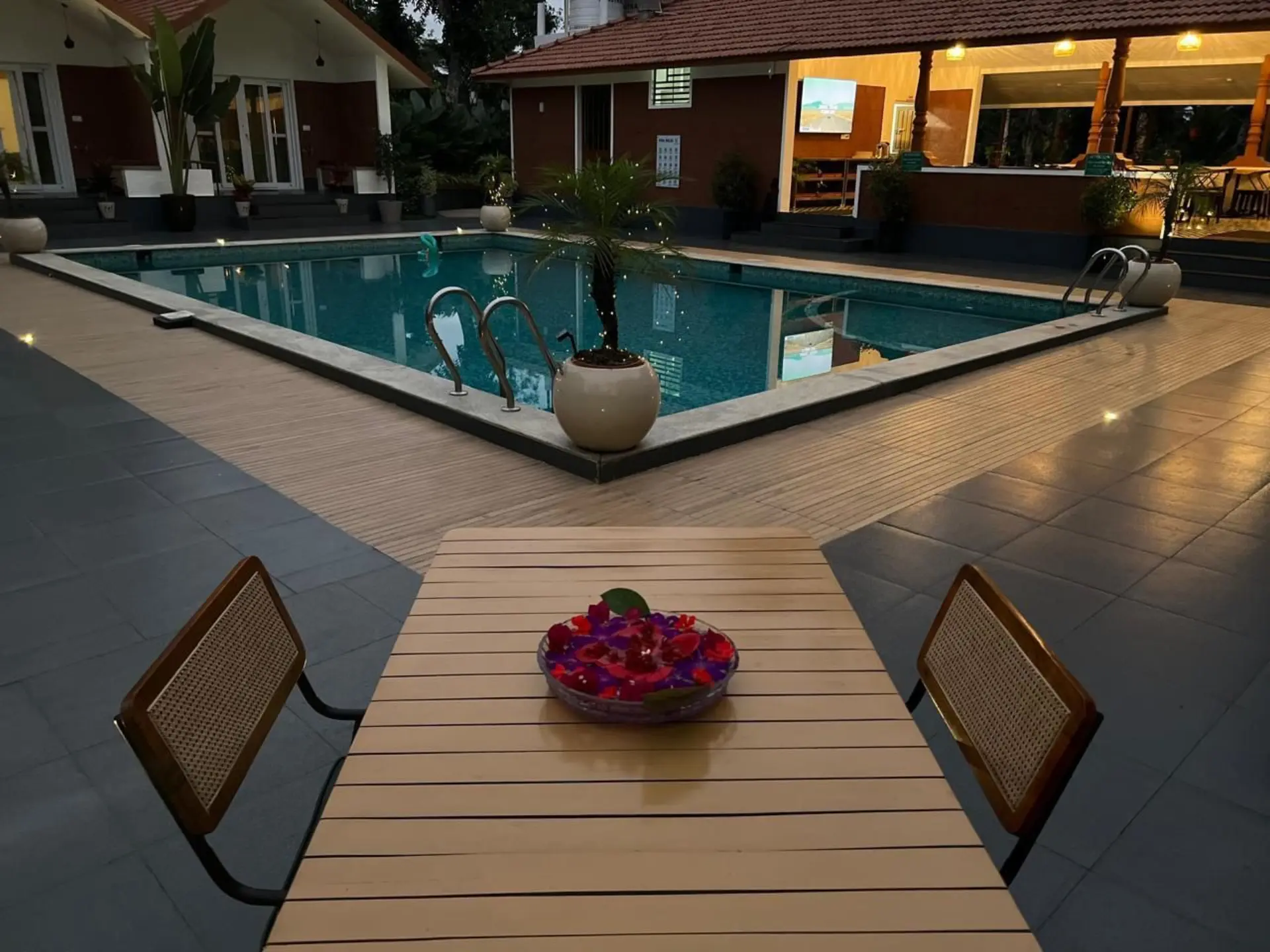 Pool and cottages at Imara Stay Coorg