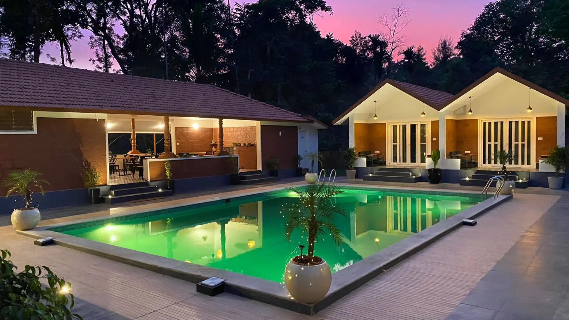 Imara Stay Coorg — luxury estate with pool at night
